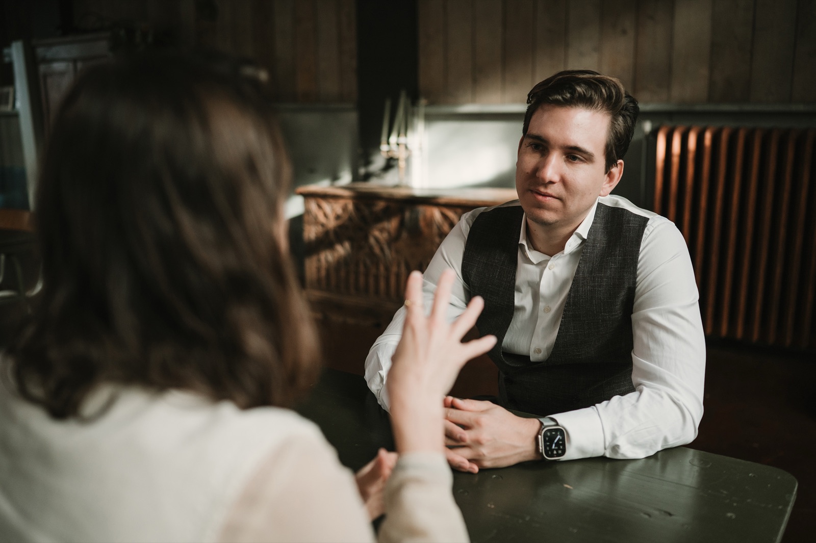 Nicolas in a coaching conversation at a table